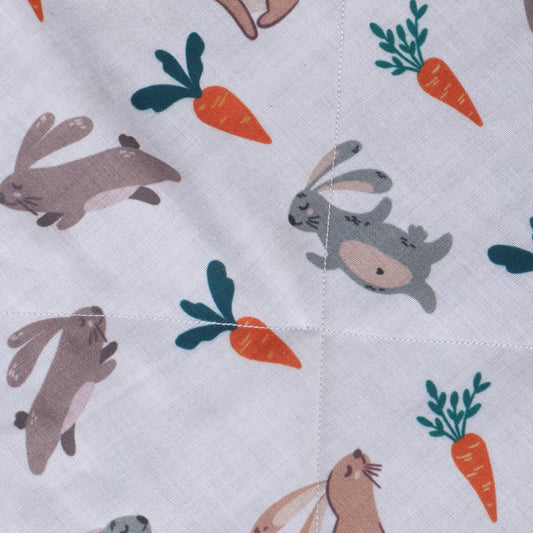 Close up of soft security blanket with comforting textures with bunny print which is perfect for soothing babies and toddlers