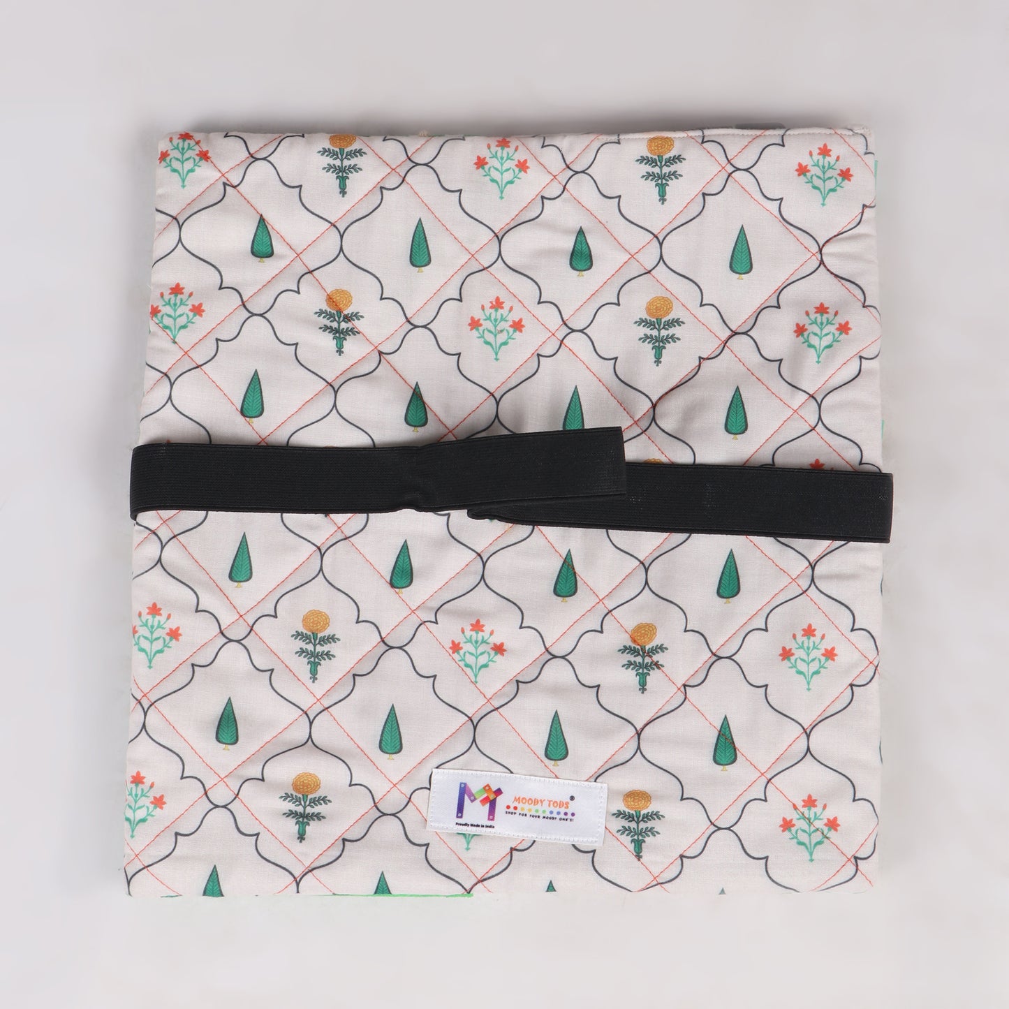 Close up of back side of sensory fidget blanket with different textures, zippers, and buttons, buckles, button maze with net, push button and Velcro and shoe lace pattern, great for tactile stimulation and calm play