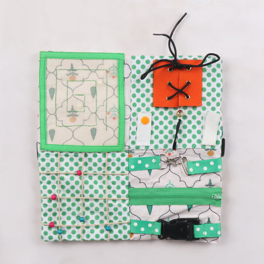Sensory fidget blanket with different textures, zippers, and buttons, buckles, button maze with net, push button and Velcro and shoe lace pattern, great for tactile stimulation and calm play
