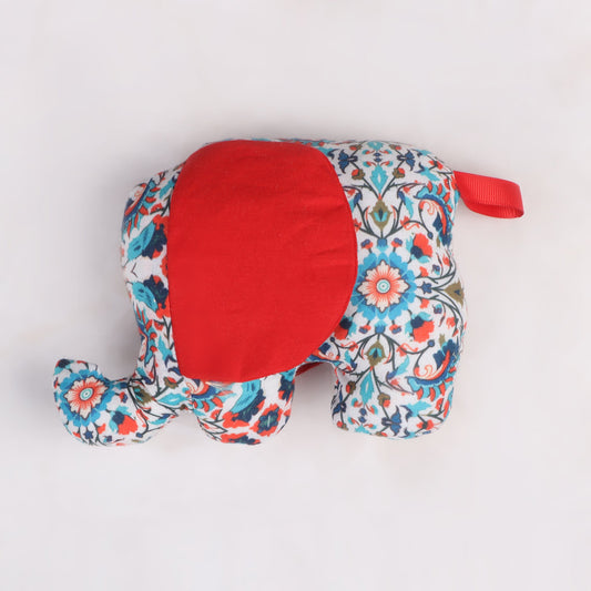 Elephant-shaped sensory taggie toy with big red colored ears for tactile exploration and comfort.