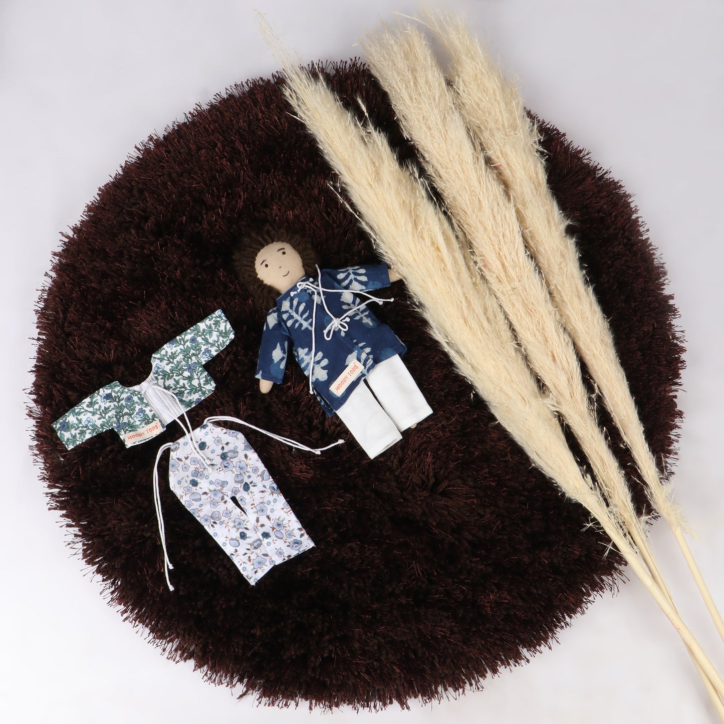 Cute 9 inch boy rag doll with interchangeable outfit made from child-safe, soft fabric