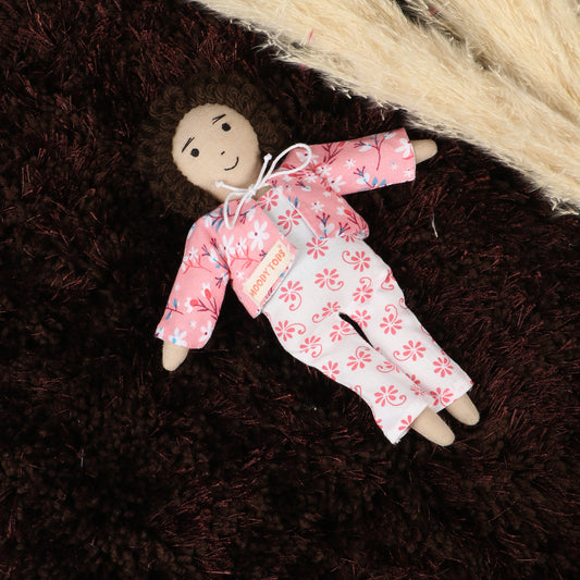 Front view of Cute 9 inch boy rag doll with brown hair and pink colored outfit, made from child-safe, soft fabric