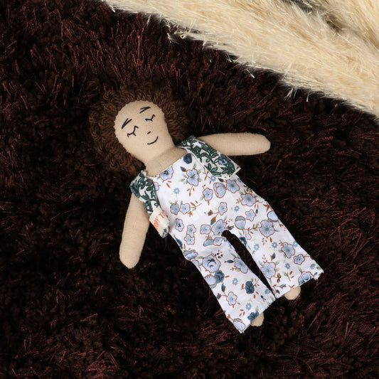 7 inch handmade fabric boy rag dolls in floral outfit made with soft, child-friendly material