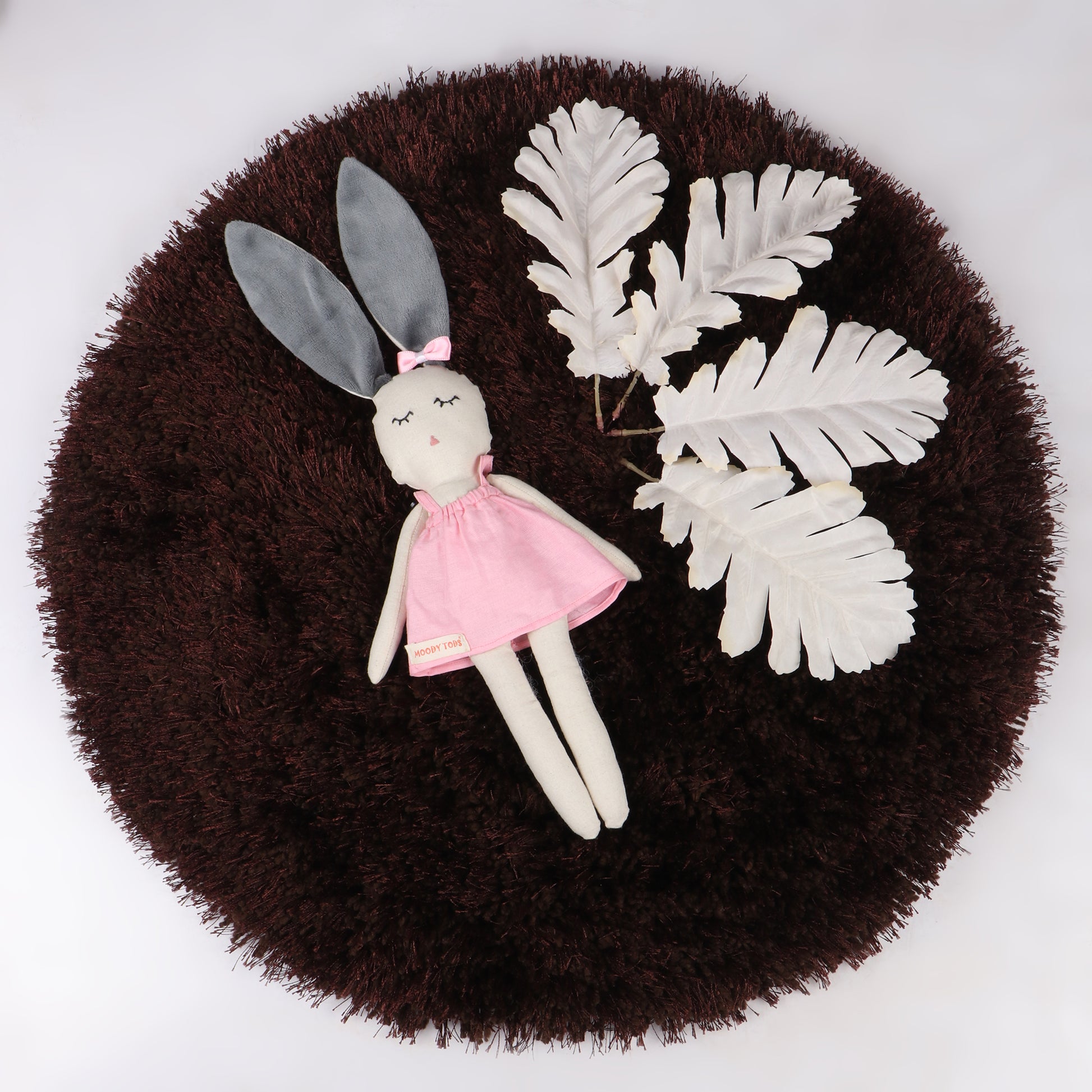 Adorable 12 inch plush bunny toy with pink pastel colored outfit, perfect for cuddles and sensory play