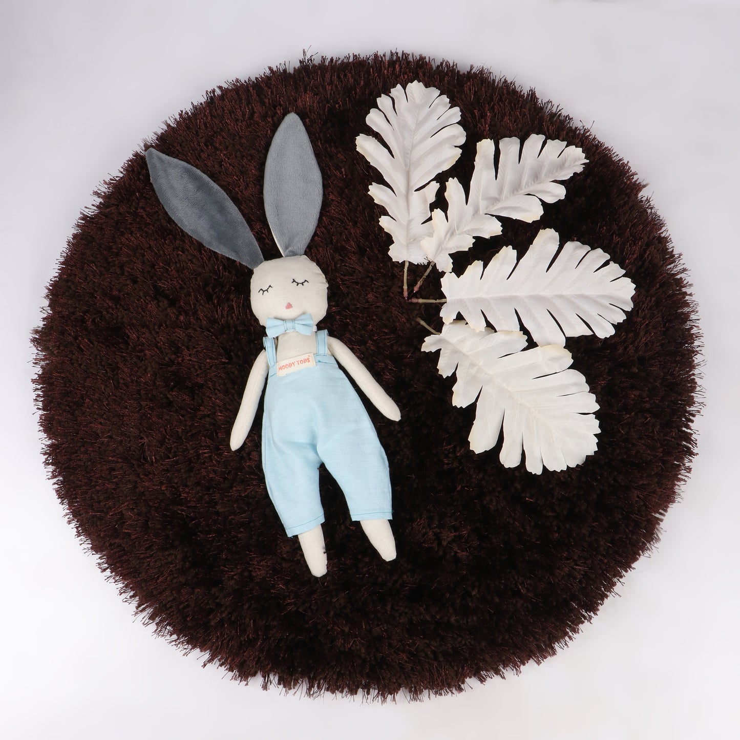 Adorable 12 inch plush bunny toy with blue pastel colored outfit, perfect for cuddles and sensory play