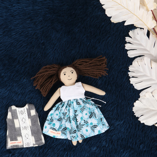 9 inch handmade fabric rag doll with interchangeable grey outfit made from child-safe, soft fabric.