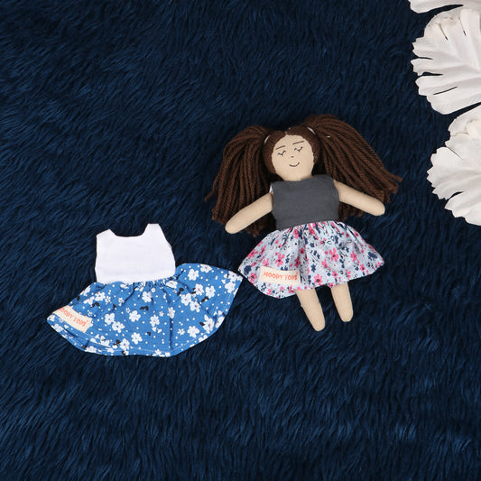 Cute 7 inch girl rag doll with colorful outfit, and interchangeable frock made from child-safe, soft fabric