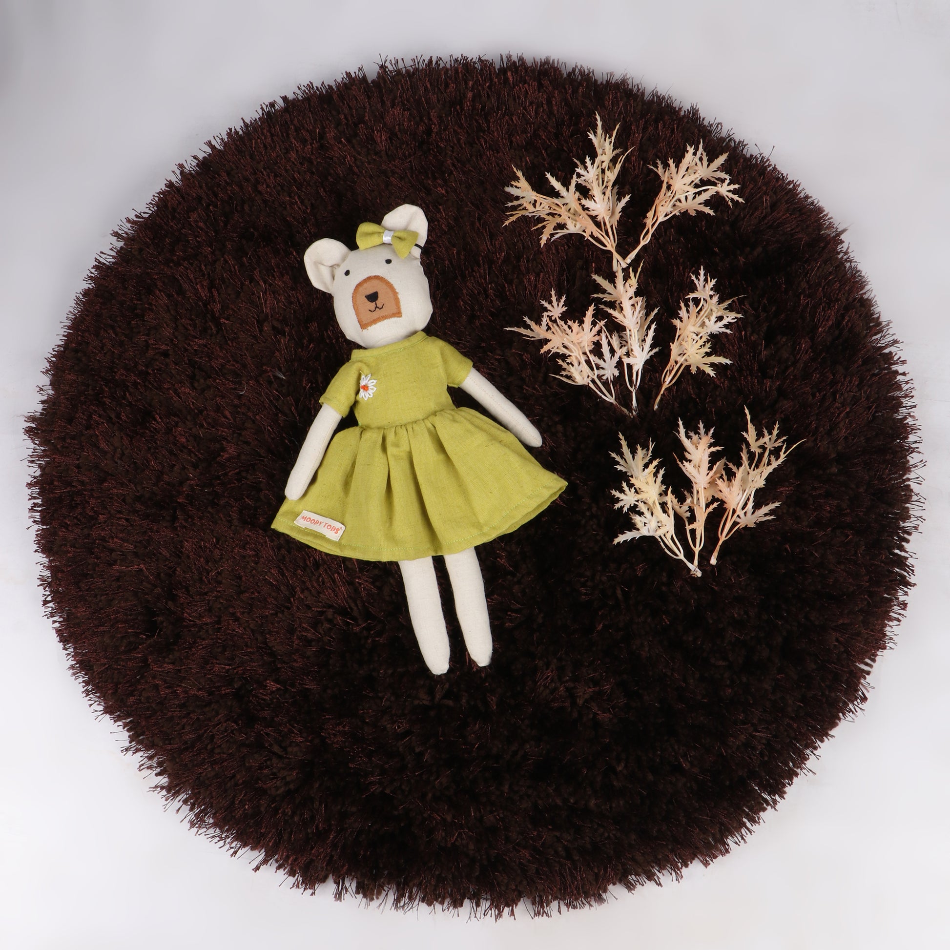 12 inch soft fabric bear doll with little hair clip and pastel green colored outfit, ideal for toddlers and young children